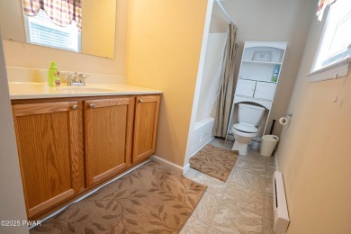Welcome to this well-maintained ranch home in The Hideout, a on The Hideout Golf in Pennsylvania - for sale on GolfHomes.com, golf home, golf lot