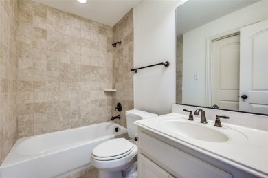 Nestled on a premier GOLF COURSE lot overlooking the tee box of on Lantana Golf Club in Texas - for sale on GolfHomes.com, golf home, golf lot