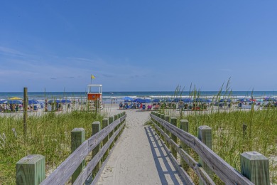 Welcome home to this beautiful, raised beach house with an on Surf Golf and Beach Club in South Carolina - for sale on GolfHomes.com, golf home, golf lot