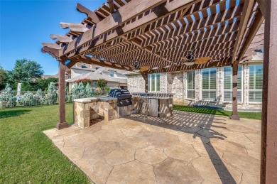 Nestled on a premier GOLF COURSE lot overlooking the tee box of on Lantana Golf Club in Texas - for sale on GolfHomes.com, golf home, golf lot