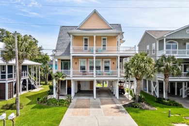 Welcome home to this beautiful, raised beach house with an on Surf Golf and Beach Club in South Carolina - for sale on GolfHomes.com, golf home, golf lot