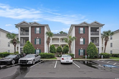 This bright 2 bedroom, 2 bath end unit in the desirable River on River Oaks Golf Plantation  in South Carolina - for sale on GolfHomes.com, golf home, golf lot