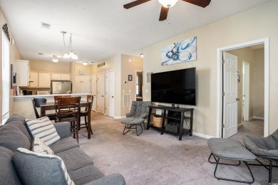 This bright 2 bedroom, 2 bath end unit in the desirable River on River Oaks Golf Plantation  in South Carolina - for sale on GolfHomes.com, golf home, golf lot