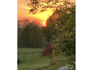 This charming cottage home is the only one in its neighborhood on Mountain Air Country Club in North Carolina - for sale on GolfHomes.com, golf home, golf lot