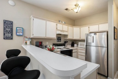 This bright 2 bedroom, 2 bath end unit in the desirable River on River Oaks Golf Plantation  in South Carolina - for sale on GolfHomes.com, golf home, golf lot