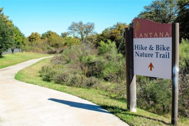 Nestled on a premier GOLF COURSE lot overlooking the tee box of on Lantana Golf Club in Texas - for sale on GolfHomes.com, golf home, golf lot