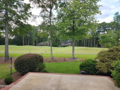 Discover this stunning all-brick home in the prestigious Cypress on Cypress Landing Golf Club in North Carolina - for sale on GolfHomes.com, golf home, golf lot