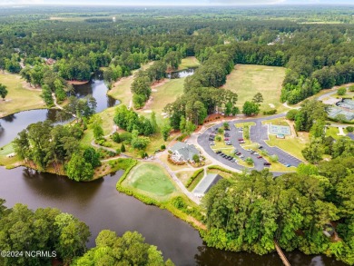 Discover this stunning all-brick home in the prestigious Cypress on Cypress Landing Golf Club in North Carolina - for sale on GolfHomes.com, golf home, golf lot