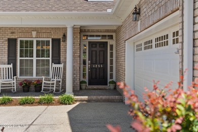 The all-brick former model home in the Regency Lakes section of on Members Club At St. James Plantation in North Carolina - for sale on GolfHomes.com, golf home, golf lot