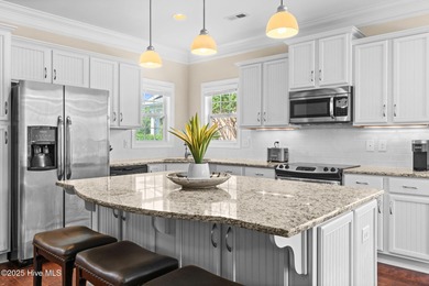 The all-brick former model home in the Regency Lakes section of on Members Club At St. James Plantation in North Carolina - for sale on GolfHomes.com, golf home, golf lot