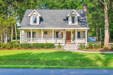 Welcome to 245 Watersedge Drive, a charming traditional home on Caledonia Golf and Fish Club in South Carolina - for sale on GolfHomes.com, golf home, golf lot