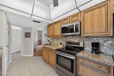Updates abound in this move-in-ready 2-bed,2-bath,2+car garage on Sun City Riverview Golf Course in Arizona - for sale on GolfHomes.com, golf home, golf lot