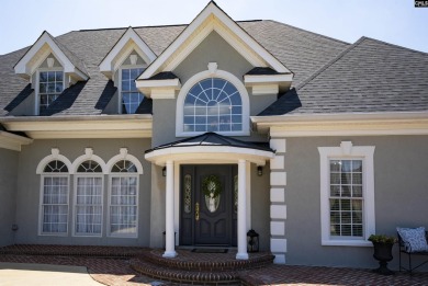 Welcome to 216 Dawn Island Trail, an elegant executive home with on Timberlake Country Club in South Carolina - for sale on GolfHomes.com, golf home, golf lot