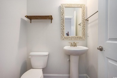 This impeccably designed 4-bedroom, 3.5-bath Mediterranean-style on Barefoot Resort and Golf Club  in South Carolina - for sale on GolfHomes.com, golf home, golf lot
