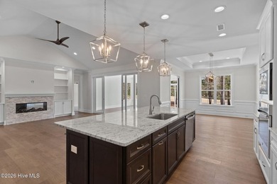 Settle into the ease of coastal living with this thoughtfully on River Landing Golf Course in North Carolina - for sale on GolfHomes.com, golf home, golf lot