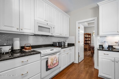 Exquisite custom brick home on a signature golf course with on Brunswick Plantation and Golf Resorts in North Carolina - for sale on GolfHomes.com, golf home, golf lot