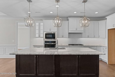 Settle into the ease of coastal living with this thoughtfully on River Landing Golf Course in North Carolina - for sale on GolfHomes.com, golf home, golf lot