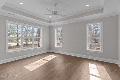 Settle into the ease of coastal living with this thoughtfully on River Landing Golf Course in North Carolina - for sale on GolfHomes.com, golf home, golf lot