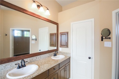 This charming three-bedroom, two-bathroom home boasts a on Twin Rivers Golf Club in Texas - for sale on GolfHomes.com, golf home, golf lot
