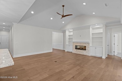 Settle into the ease of coastal living with this thoughtfully on River Landing Golf Course in North Carolina - for sale on GolfHomes.com, golf home, golf lot