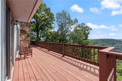 Breathtaking views of Lake Leatherwood and the Ozark Mountains on Holiday Island Executive Golf Course in Arkansas - for sale on GolfHomes.com, golf home, golf lot