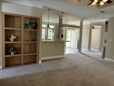 This spacious 2006 Palm Harbor is the height of glory in Del on Del Tura Golf and Country Club in Florida - for sale on GolfHomes.com, golf home, golf lot