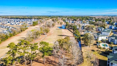 njoy resort-style living in this beautiful 2-bedroom, 2-bath on River Oaks Golf Plantation  in South Carolina - for sale on GolfHomes.com, golf home, golf lot