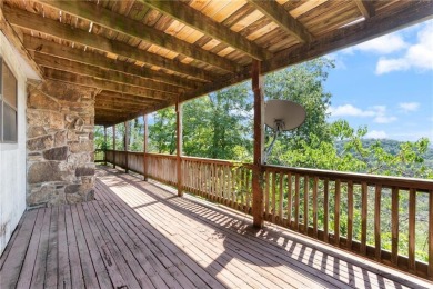 Breathtaking views of Lake Leatherwood and the Ozark Mountains on Holiday Island Executive Golf Course in Arkansas - for sale on GolfHomes.com, golf home, golf lot