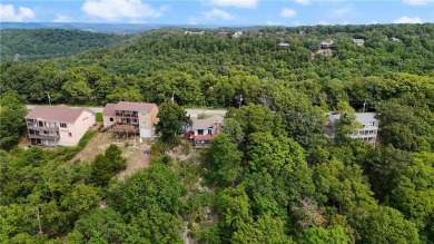Breathtaking views of Lake Leatherwood and the Ozark Mountains on Holiday Island Executive Golf Course in Arkansas - for sale on GolfHomes.com, golf home, golf lot