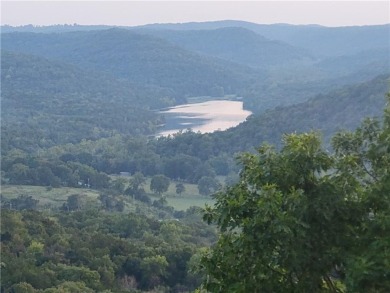 Breathtaking views of Lake Leatherwood and the Ozark Mountains on Holiday Island Executive Golf Course in Arkansas - for sale on GolfHomes.com, golf home, golf lot
