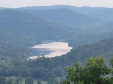 Breathtaking views of Lake Leatherwood and the Ozark Mountains on Holiday Island Executive Golf Course in Arkansas - for sale on GolfHomes.com, golf home, golf lot