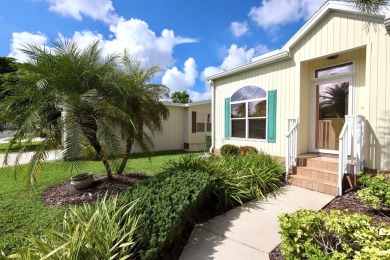 This spacious 2006 Palm Harbor is the height of glory in Del on Del Tura Golf and Country Club in Florida - for sale on GolfHomes.com, golf home, golf lot