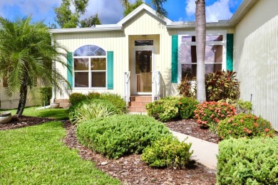 This spacious 2006 Palm Harbor is the height of glory in Del on Del Tura Golf and Country Club in Florida - for sale on GolfHomes.com, golf home, golf lot