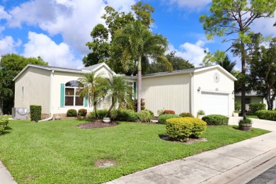 This spacious 2006 Palm Harbor is the height of glory in Del on Del Tura Golf and Country Club in Florida - for sale on GolfHomes.com, golf home, golf lot