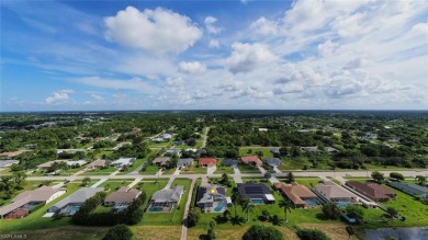 NO FLOOD ZONE HERE! This CUSTOM-BUILT ARTHUR RUTTENBERG ESTATE on Mirror Lakes Golf Club in Florida - for sale on GolfHomes.com, golf home, golf lot