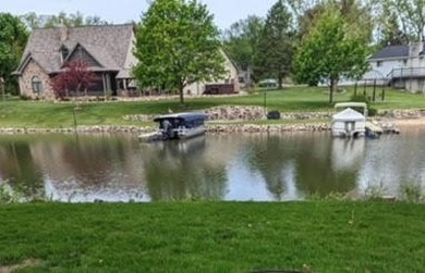 Come enjoy all the benefits of wake free lake life!  Perfectly on Clark Lake Golf Club in Michigan - for sale on GolfHomes.com, golf home, golf lot