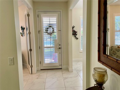 Stunning end unit, 3/2/2, 2013 built, split floor plan, 1471sf on Bobcat Trail Golf Club in Florida - for sale on GolfHomes.com, golf home, golf lot