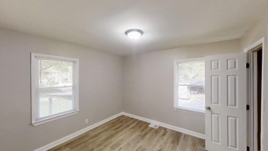 Welcome to this beautifully updated 3-bedroom, 1-bath ranch on Browns Mill Golf Course in Georgia - for sale on GolfHomes.com, golf home, golf lot