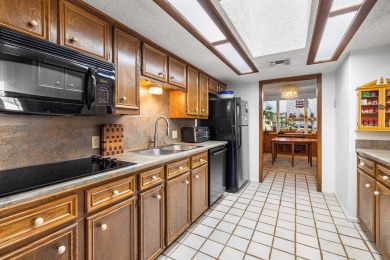 Delightful one-story townhome overlooking the #5 fairway on on Riverhill Country Club in Texas - for sale on GolfHomes.com, golf home, golf lot