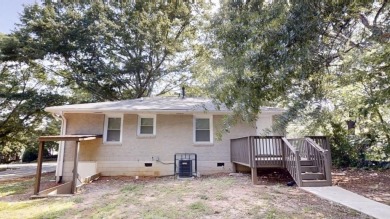 Welcome to this beautifully updated 3-bedroom, 1-bath ranch on Browns Mill Golf Course in Georgia - for sale on GolfHomes.com, golf home, golf lot
