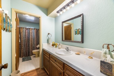 Delightful one-story townhome overlooking the #5 fairway on on Riverhill Country Club in Texas - for sale on GolfHomes.com, golf home, golf lot