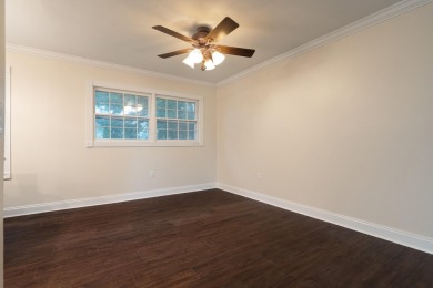 Freshly painted and new floors, start living your dream in this on Fort Walton Beach Golf Course in Florida - for sale on GolfHomes.com, golf home, golf lot