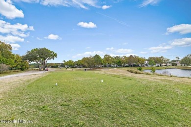 Outstanding value and serene golf course living is waiting for on Golf Club At South Hampton in Florida - for sale on GolfHomes.com, golf home, golf lot