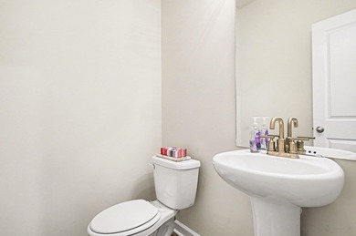 Welcome to this beautifully maintained 4-bedroom, 2.5-bath home on River Oaks Golf Plantation  in South Carolina - for sale on GolfHomes.com, golf home, golf lot