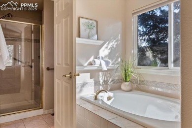Exquisitely located on the edge of 22 acres of HOA owned forest on The Ridge At Castle Pines North in Colorado - for sale on GolfHomes.com, golf home, golf lot
