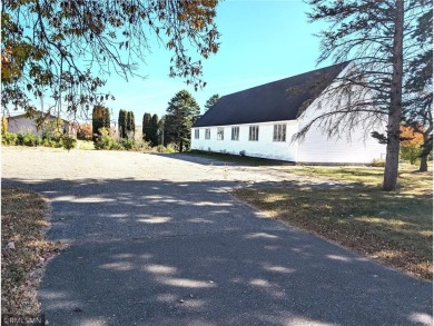 Formerly used as a church, this empty commercial zoned building on Long Prairie Country Club in Minnesota - for sale on GolfHomes.com, golf home, golf lot