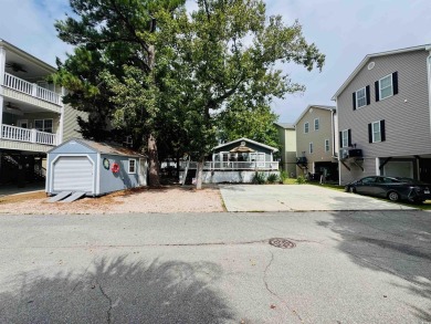 JUST LISTED... LARGE DOUBLE WIDE BEACH HOUSE ON EXTRA LARGE LOT on Prestwick Country Club in South Carolina - for sale on GolfHomes.com, golf home, golf lot