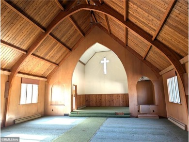 Formerly used as a church, this empty commercial zoned building on Long Prairie Country Club in Minnesota - for sale on GolfHomes.com, golf home, golf lot