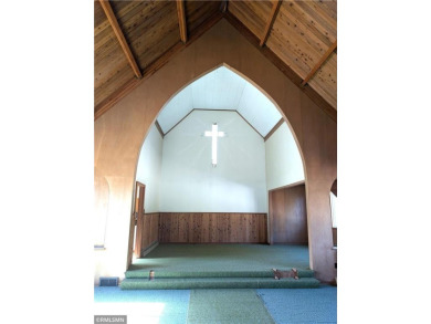 Formerly used as a church, this empty commercial zoned building on Long Prairie Country Club in Minnesota - for sale on GolfHomes.com, golf home, golf lot