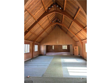 Formerly used as a church, this empty commercial zoned building on Long Prairie Country Club in Minnesota - for sale on GolfHomes.com, golf home, golf lot